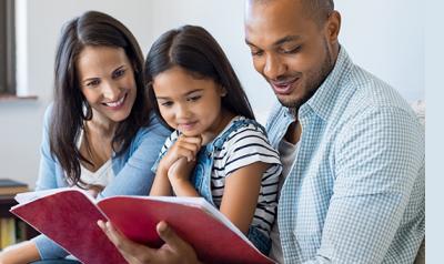 Parents reading with child