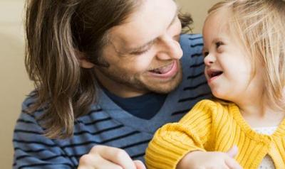 Father and daughter laughing