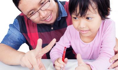 Father and daughter engaging in learning