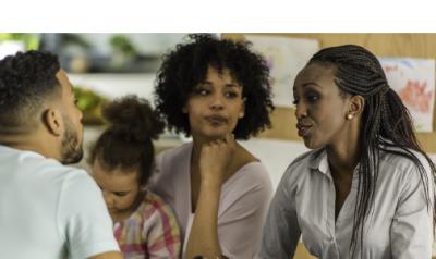 Family and Teacher in a classroom