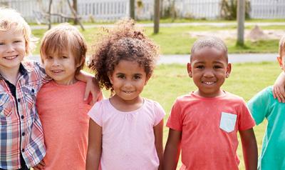 Group of children posing outside