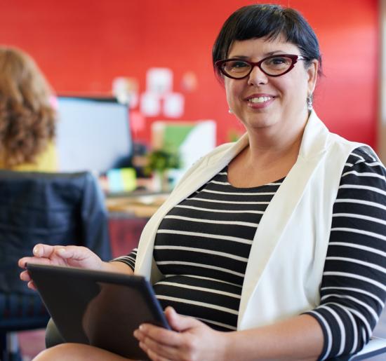 Woman holding electronic tablet