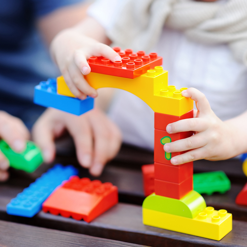 Child playing with legos