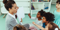 a teacher reading to children