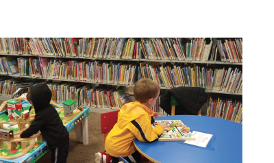 Children playing in play centers at a library